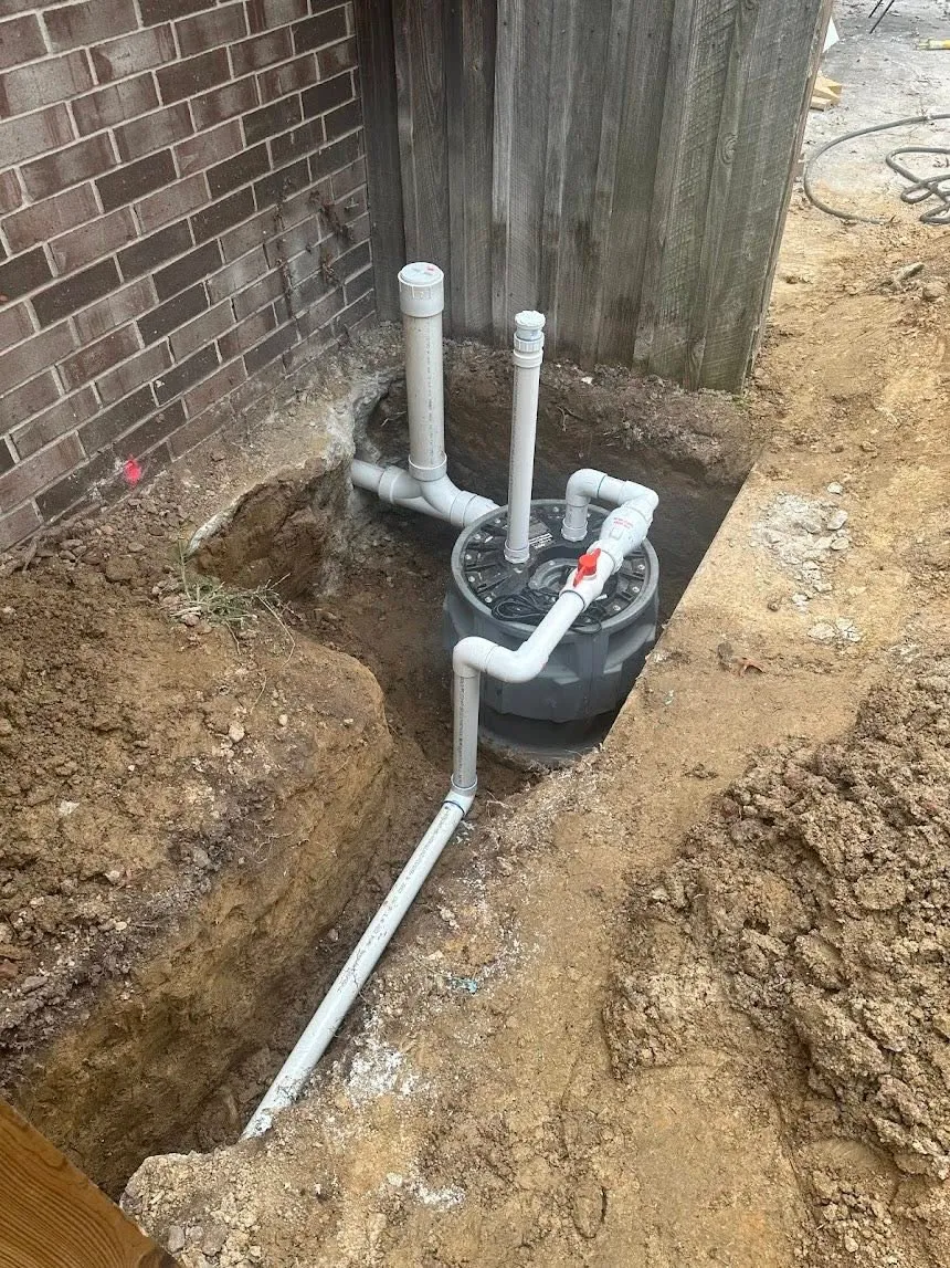 Sump pump and ejector pit installation with PVC piping