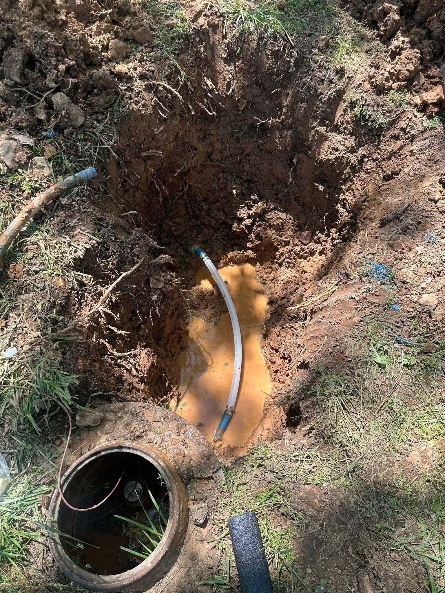 Underground water line repair at a meter connection